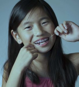 flossing with braces